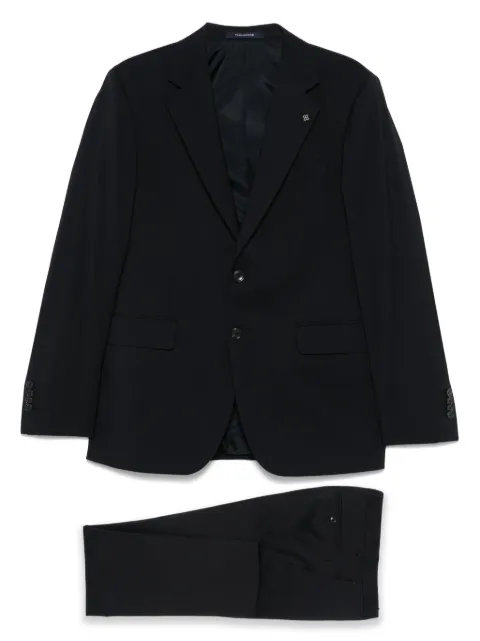 Tagliatore traje con botones