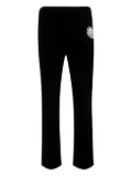 SAINT MXXXXXX logo-patch trousers - Black