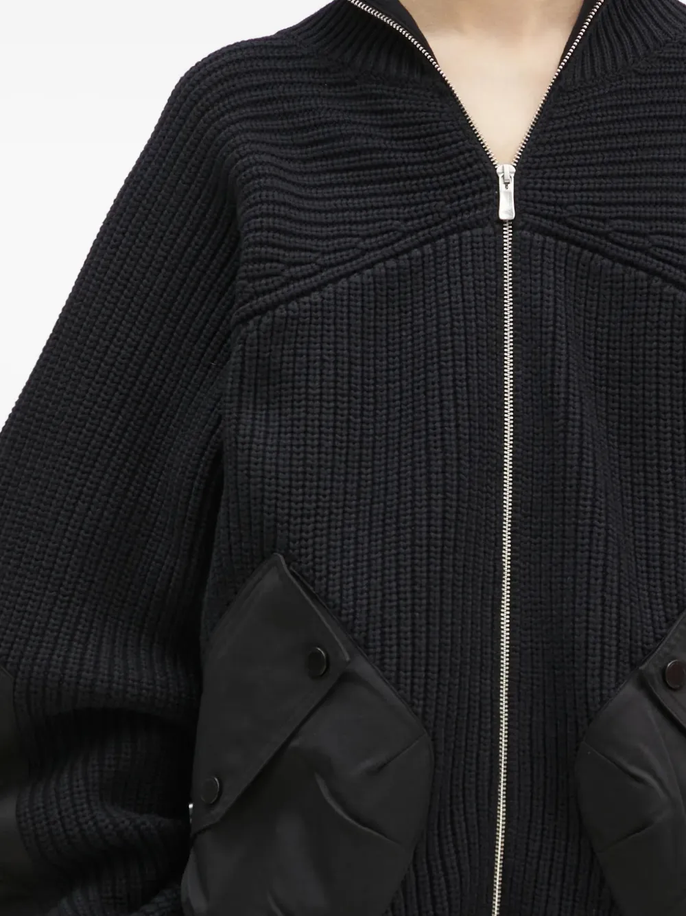 A.A. Spectrum Saxon geribbeld vest met rits en vlakken Zwart