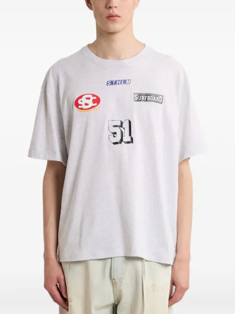 Stockholm Surfboard Club playera oversize con estampado gráfico