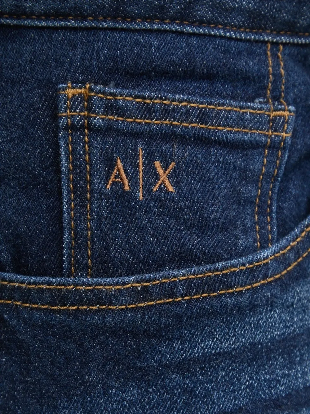 Armani Exchange logo-embroidered jeans Blauw