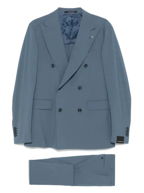 Tagliatore traje con doble botonadura
