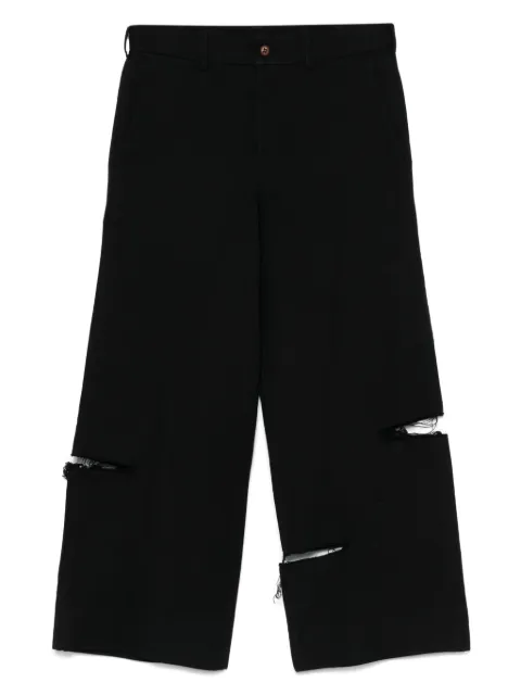 Black Comme Des Garçons distressed trousers 
