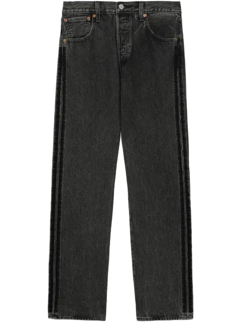 Undercover logo-patch jeans 