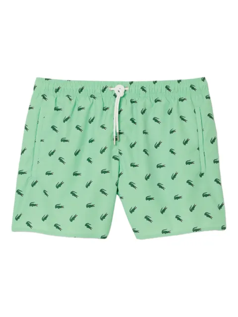 Lacoste shorts de playa con cocodrilos estampados