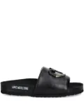 Love Moschino logo-print leather slides - Black