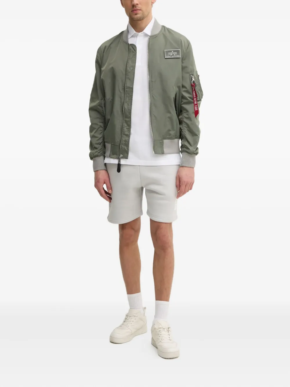 Alpha Industries Bomberjack met ritszak Groen