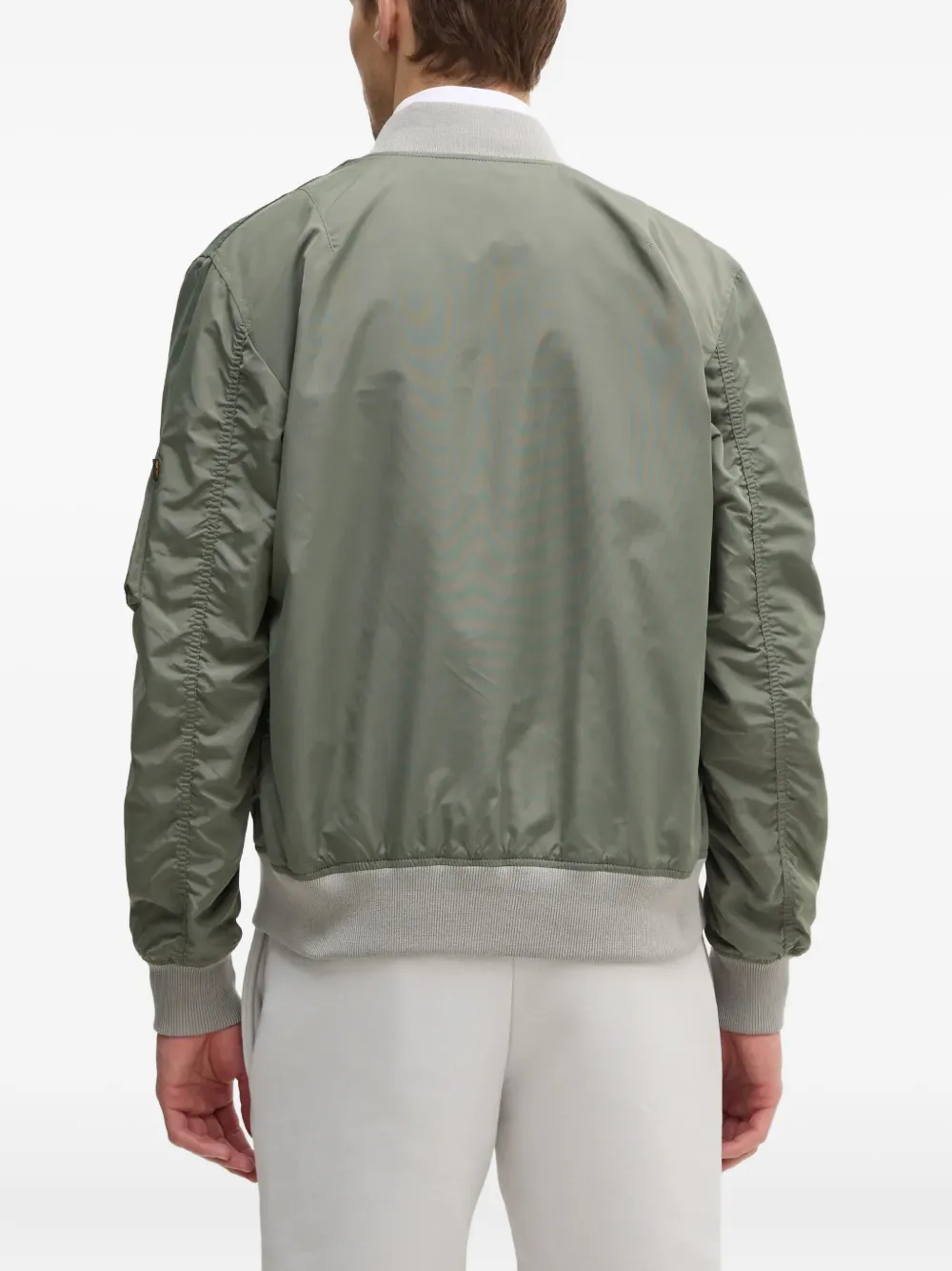 Alpha Industries Bomberjack met ritszak Groen
