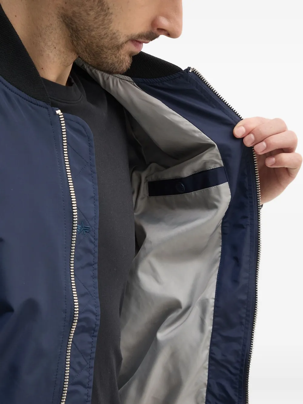 Alpha Industries Bomberjack met ritszak Blauw
