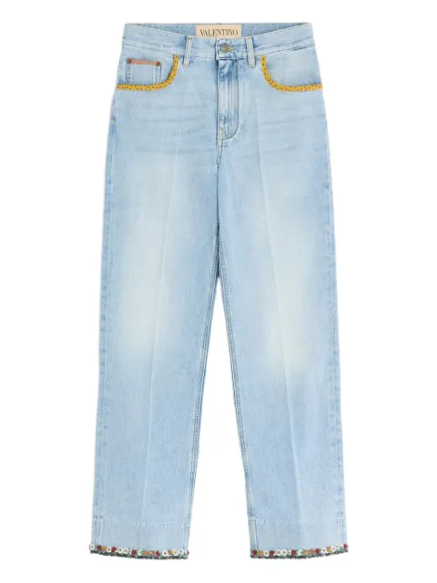 Valentino Garavani floral-hem faded jeans