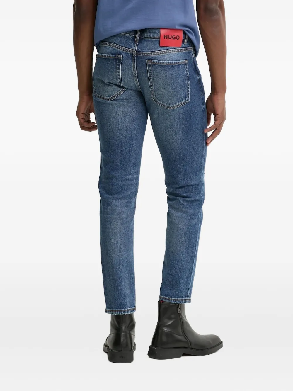 HUGO Gerafelde jeans met toelopende pijpen Blauw