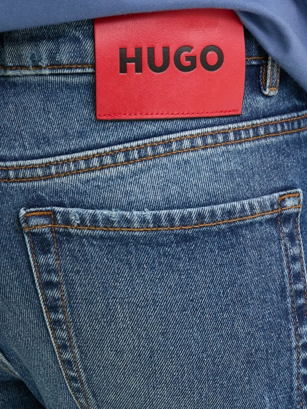 HUGO Gerafelde jeans met toelopende pijpen Blauw