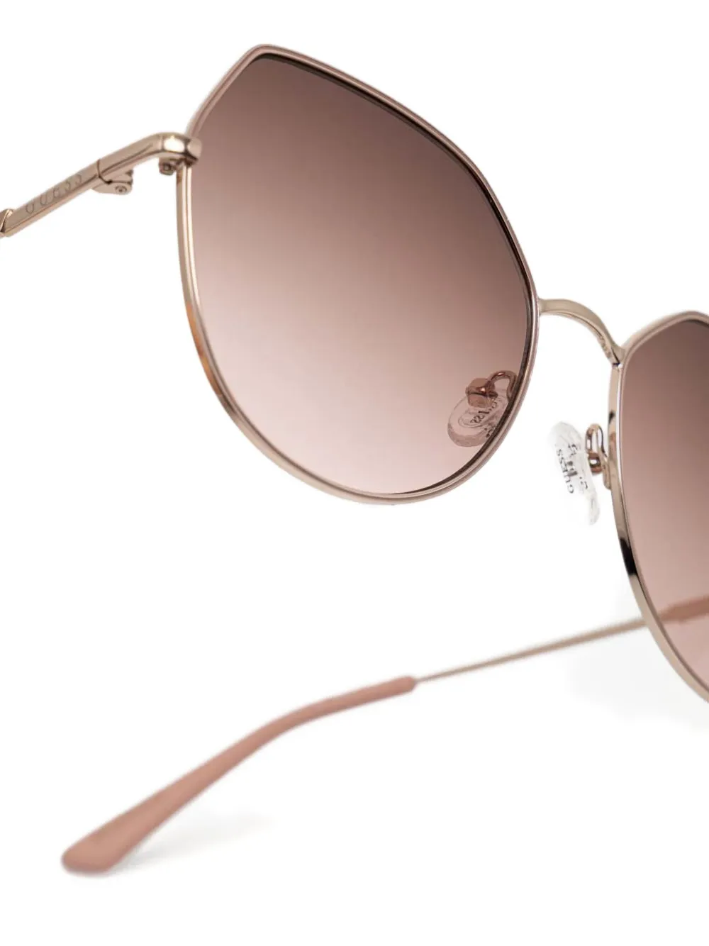 GUESS EYEWEAR Zonnebril met achthoekig montuur Roze