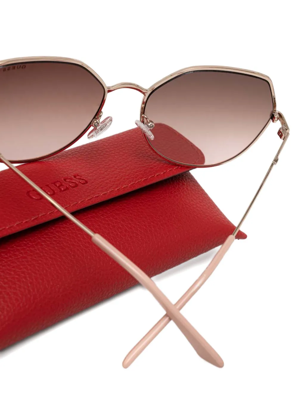 GUESS EYEWEAR Zonnebril met achthoekig montuur Roze