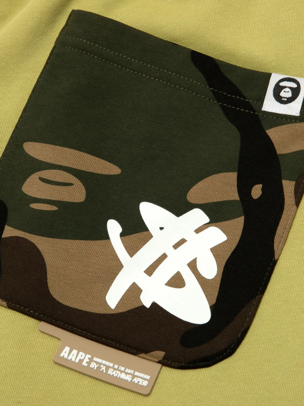 AAPE BY *A BATHING APE Shorts met grafische print Groen
