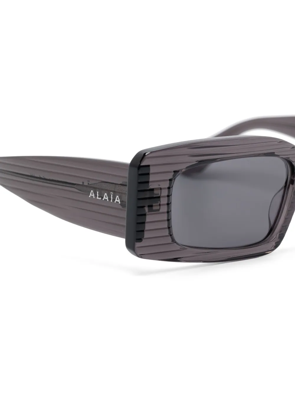 Alaia Eyewear Zonnebril met rechthoekig montuur Grijs