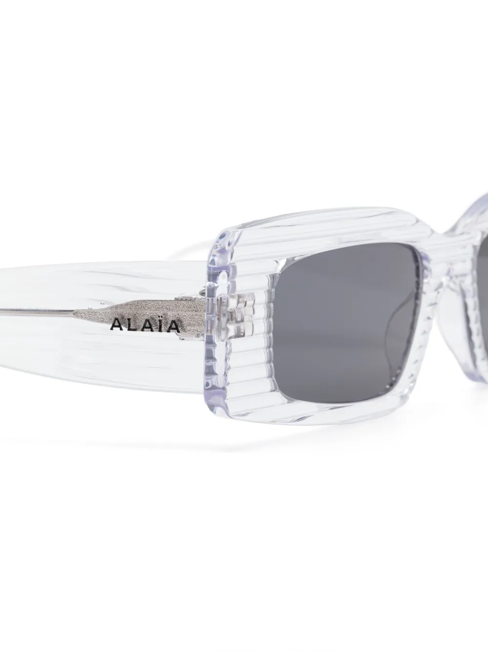 Alaia Eyewear Zonnebril met rechthoekig montuur Grijs