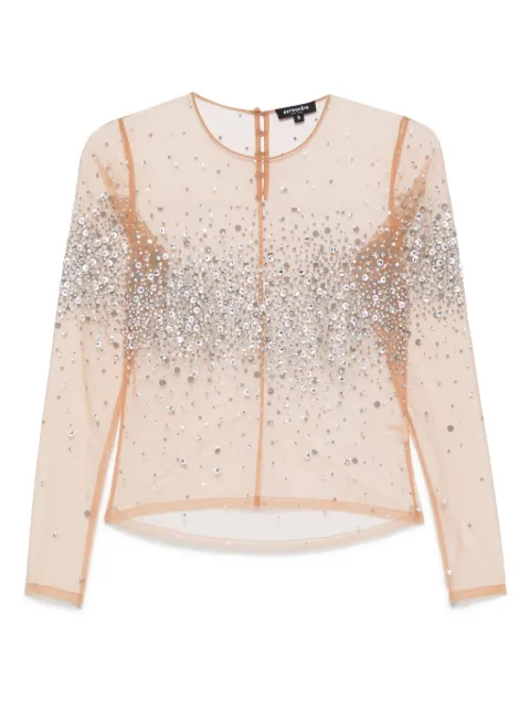 Retrofete playera con detalles de strass