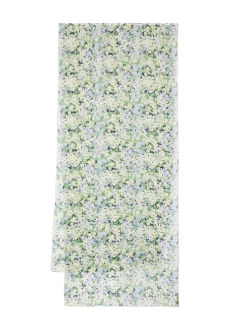 Raquel Diniz mascada con estampado floral