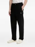 Filling Pieces embroidered-logo trousers - Black