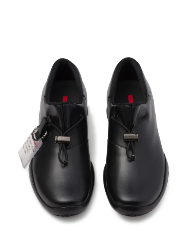 Prada Toblach スリッポンスニーカー | ブラック | FARFETCH JP