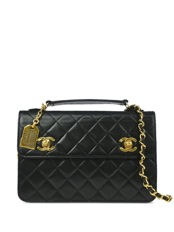 CHANEL Pre-Owned 1990 Double Turn-Lock Handbag | Black | FARFETCH CA CHANEL Pre-Owned 1990 Double Turn-Lock Handbag | Black | FARFETCH CA