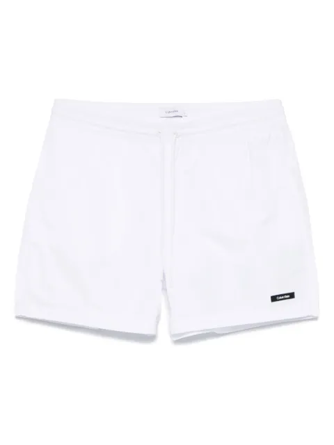 Calvin Klein logo-patch swim shorts