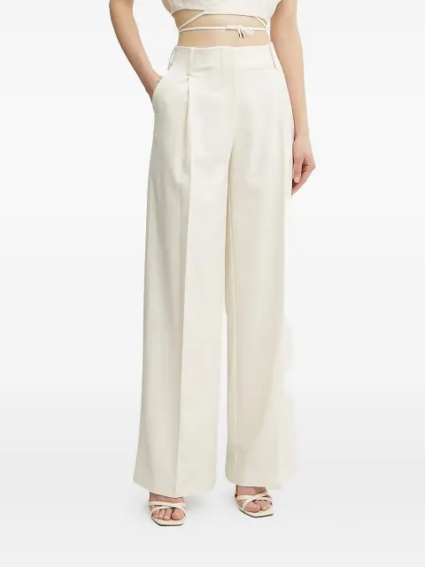 SIMONA CORSELLINI front-pleated trousers
