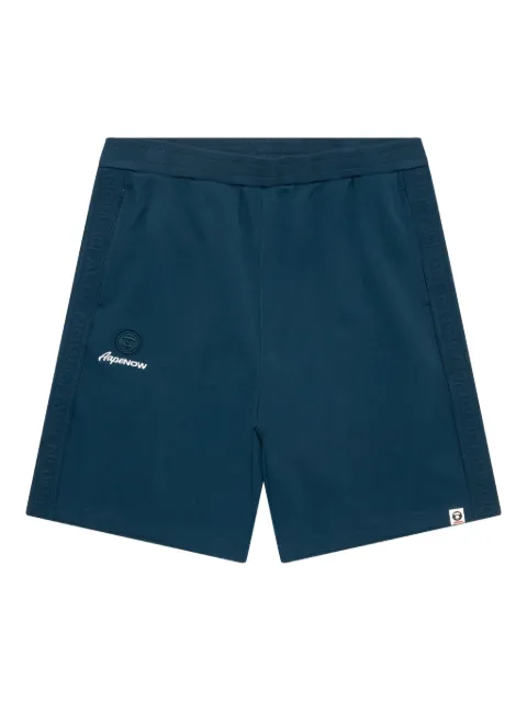 AAPE BY *A BATHING APE® shorts deportivos con franjas del logo