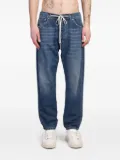 STATE OF ORDER logo-patch jeans - Blue