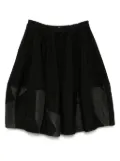 Black Comme Des Garçons patchwork skirt