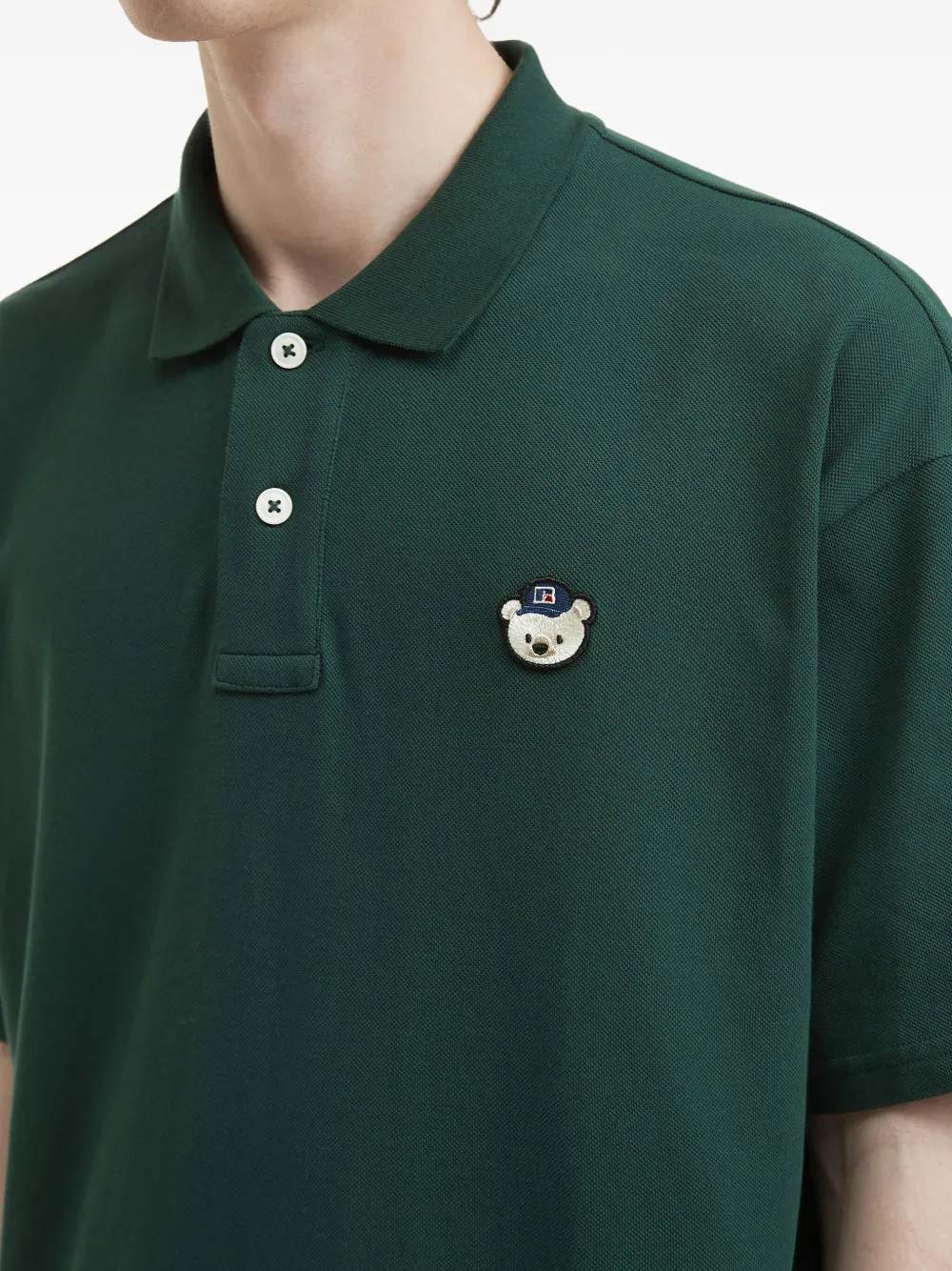 CHOCOOLATE x Russell Athletic poloshirt met logopatch Groen