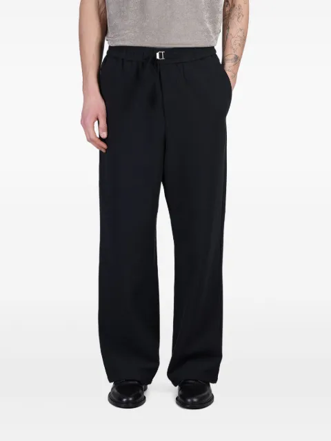 AMI Paris logo-buckled trousers 
