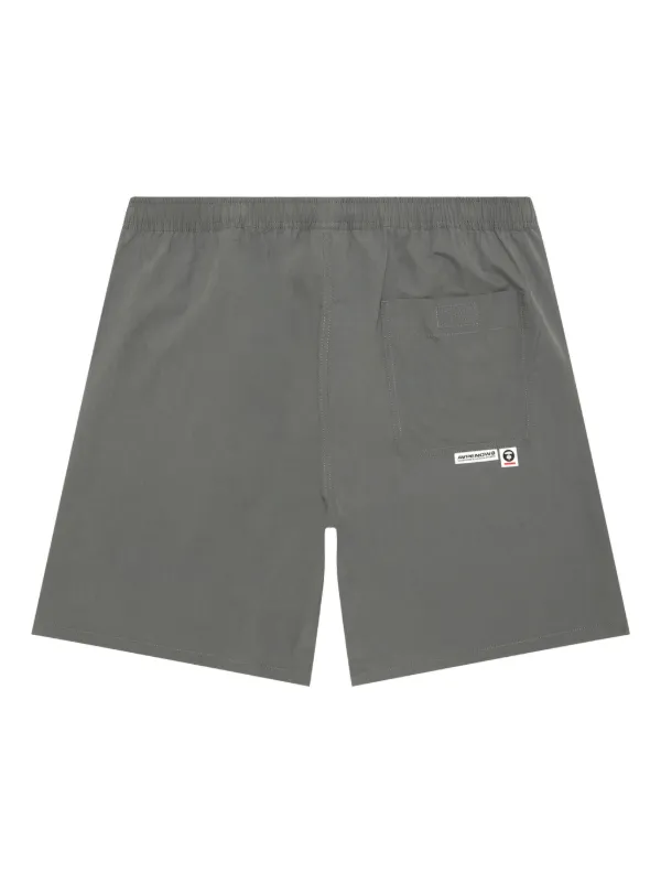 A BATHING APE BAPEロゴテープショートパンツ グレーハーフパンツ AAPE BY *A BATHING APE® ロゴパッチ ショートパンツ | グレー