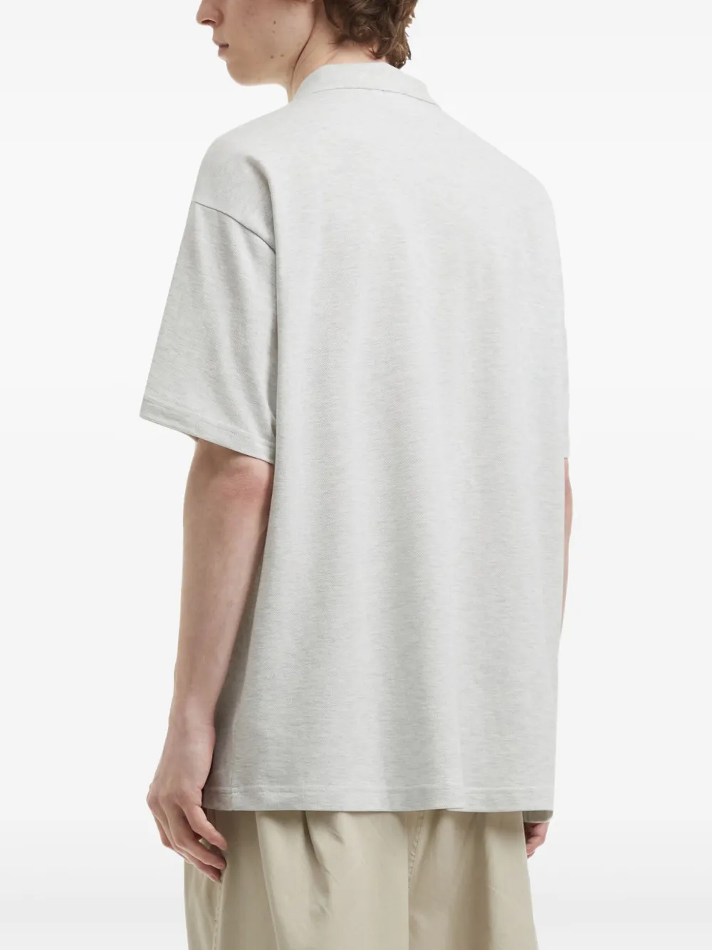 CHOCOOLATE x Russell Athletic poloshirt met logopatch Grijs