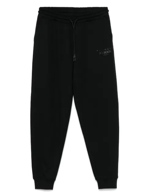 John Richmond pants con logo y detalles