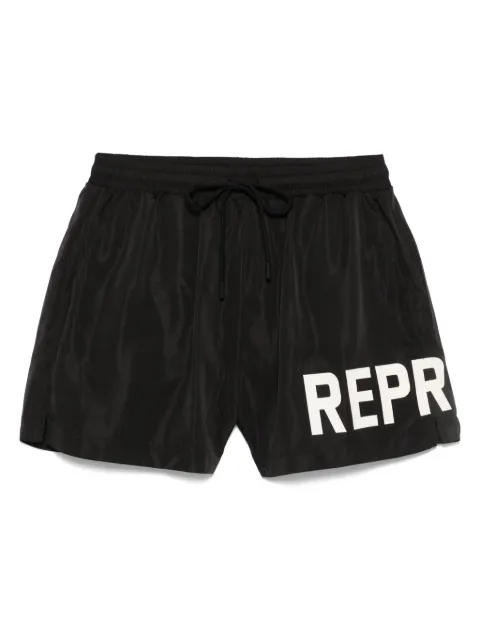 Represent shorts de playa con logo estampado