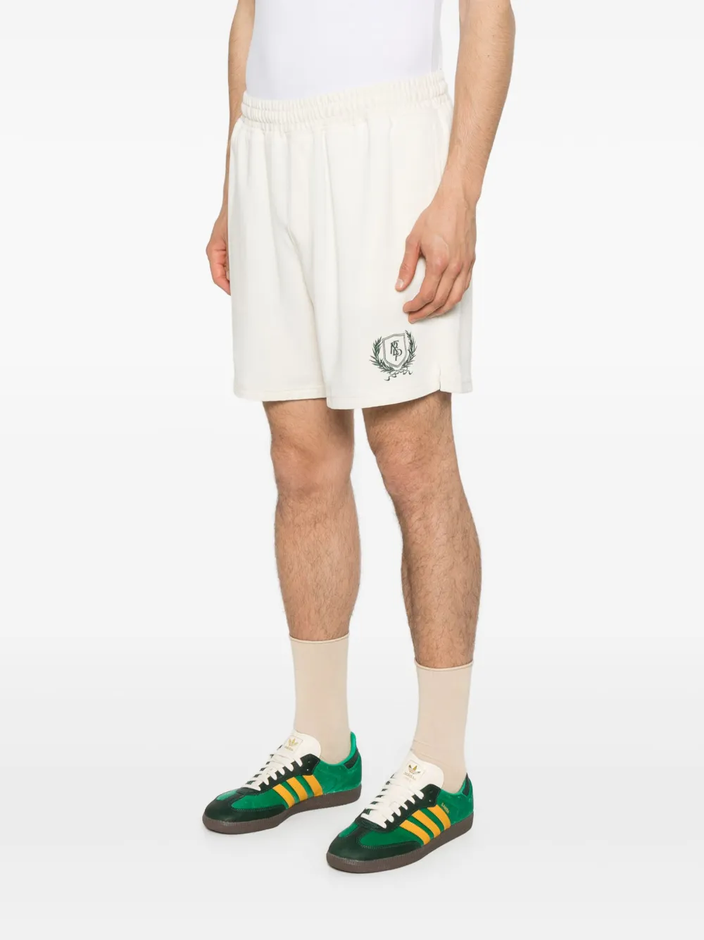Represent Shorts met geborduurd logo Beige