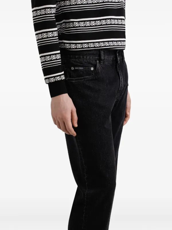 DOLCE&GABBANA ブラックデニム ロゴプレートが綺麗 Dolce & Gabbana ロゴプレート ジーンズ | ブラック | FARFETCH JP