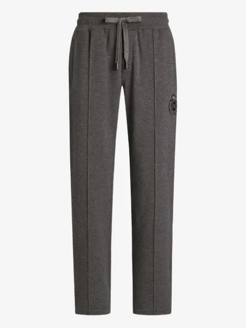Dolce & Gabbana pants con logo bordado y rayas laterales