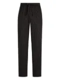 Dolce & Gabbana micro-dot drawstring trousers - Black