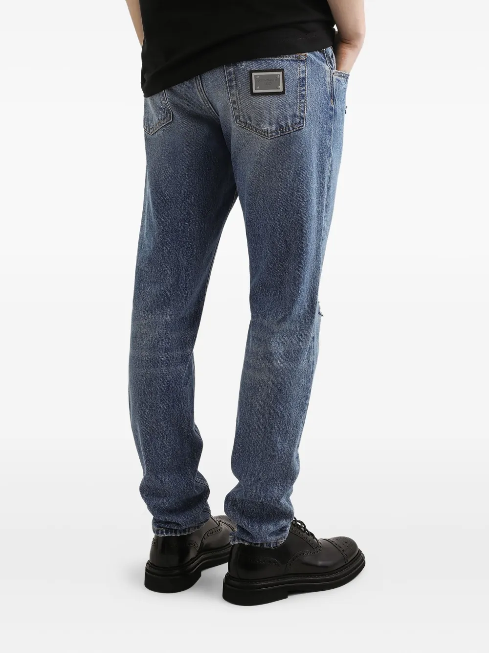 Dolce & Gabbana distressed logo-plaque jeans Blauw
