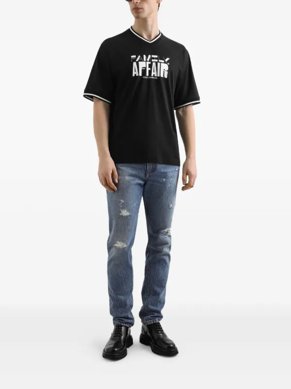 Dolce & Gabbana Distressed logo-plaque Jeans | Blue