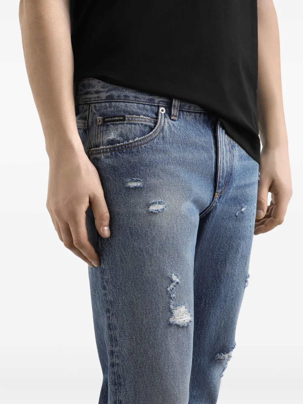 Dolce & Gabbana distressed logo-plaque jeans Blauw