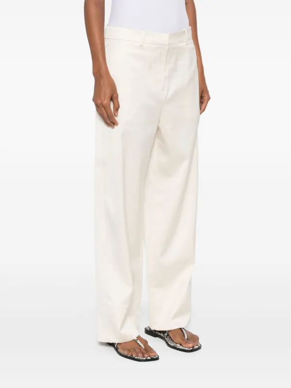 TOTEME twisted-seam Trousers | Neutrals | FARFETCH
