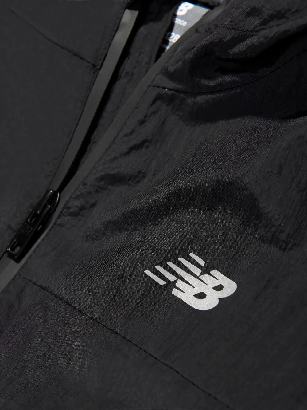 New Balance Kids Gewatteerd jack met capuchon Zwart