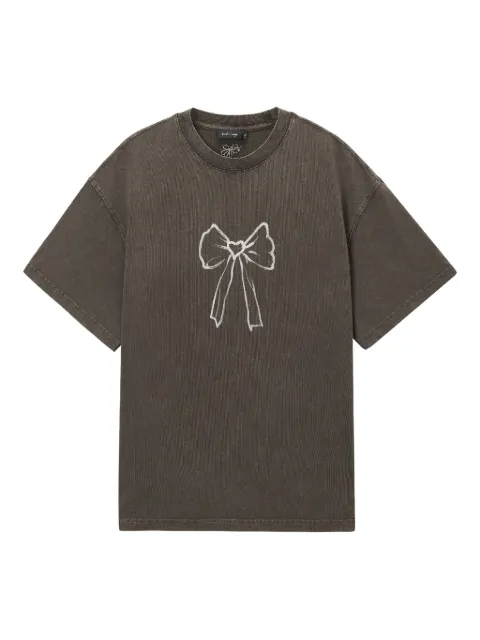 tout a coup playera con moño estampado