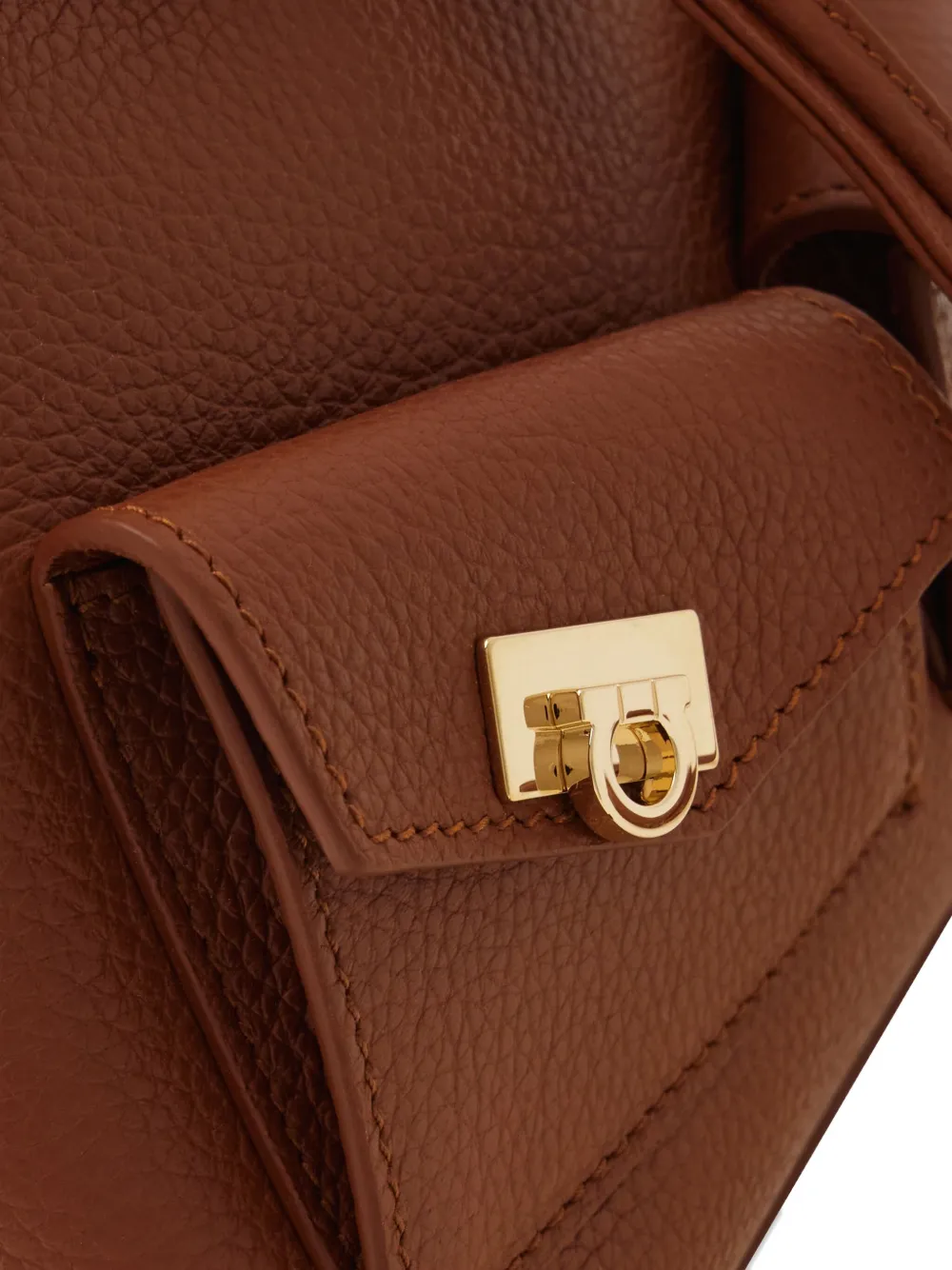 Ferragamo geometric-flap drawstring backpack Bruin