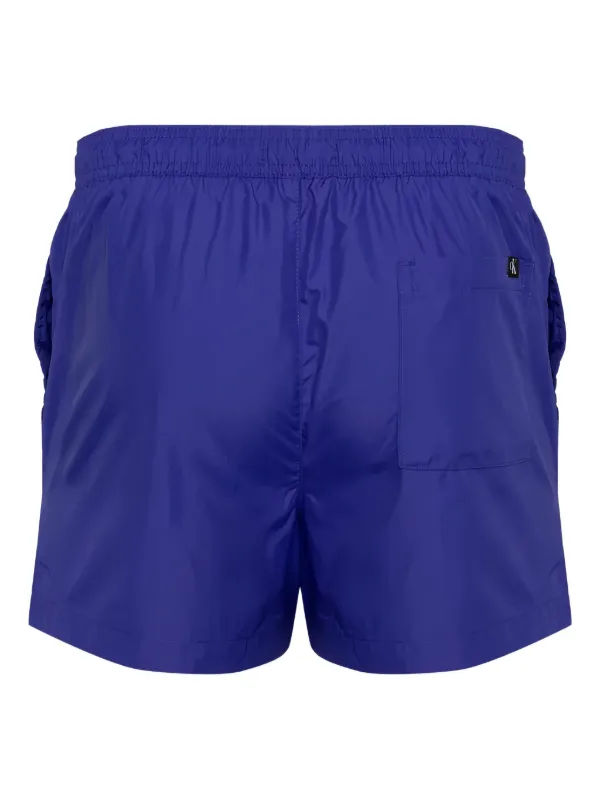  /カルバンクライン ロゴ スイムトランクス Calvin Klein ロゴ トランクス水着 | オレンジ | FARFETCH JP