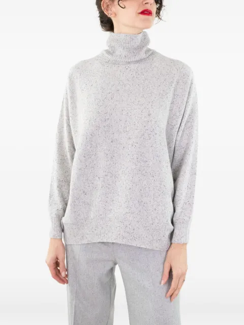 D.Exterior speckled turtleneck sweater
